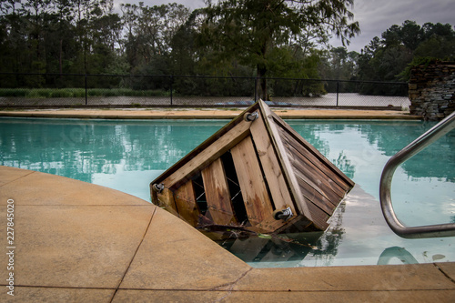 Trash can in pool after hurricane Michael photo