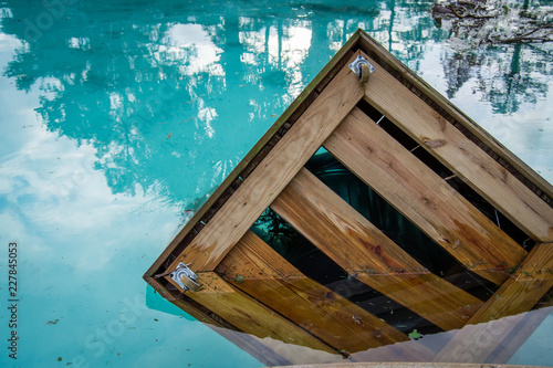 Trash can in pool after hurricane Michael photo