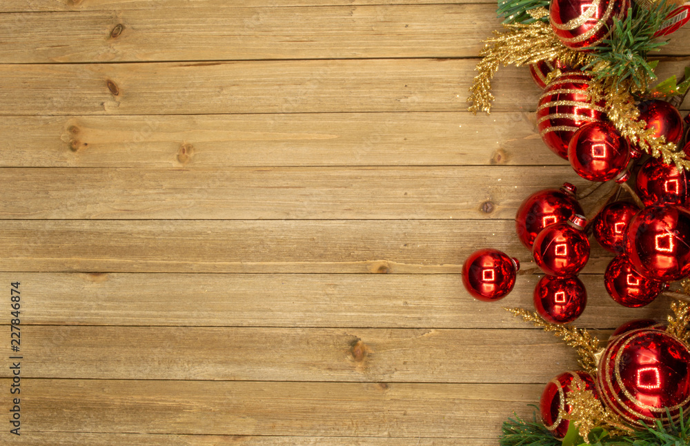Holiday wood background with red ornaments Holiday wood background with red ornaments