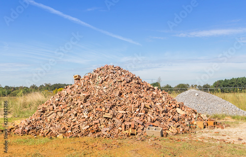 Tableau sur toile Mound of Brown Bricks:  Mound of brown bricks used for landscaping construction on display and for sale