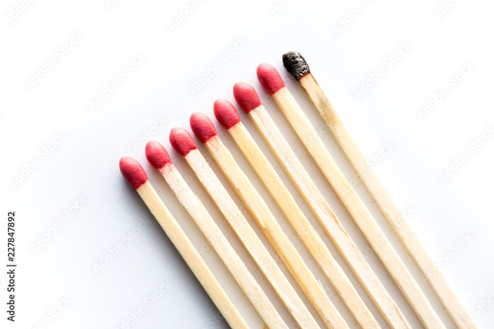one burnt match with several unburnt matches one burnt match with several unburnt matches