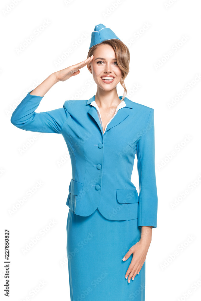 Portrait of charming stewardess wearing in blue uniform. Isolated on white background. Portrait of charming stewardess wearing in blue uniform. Isolated on white background.