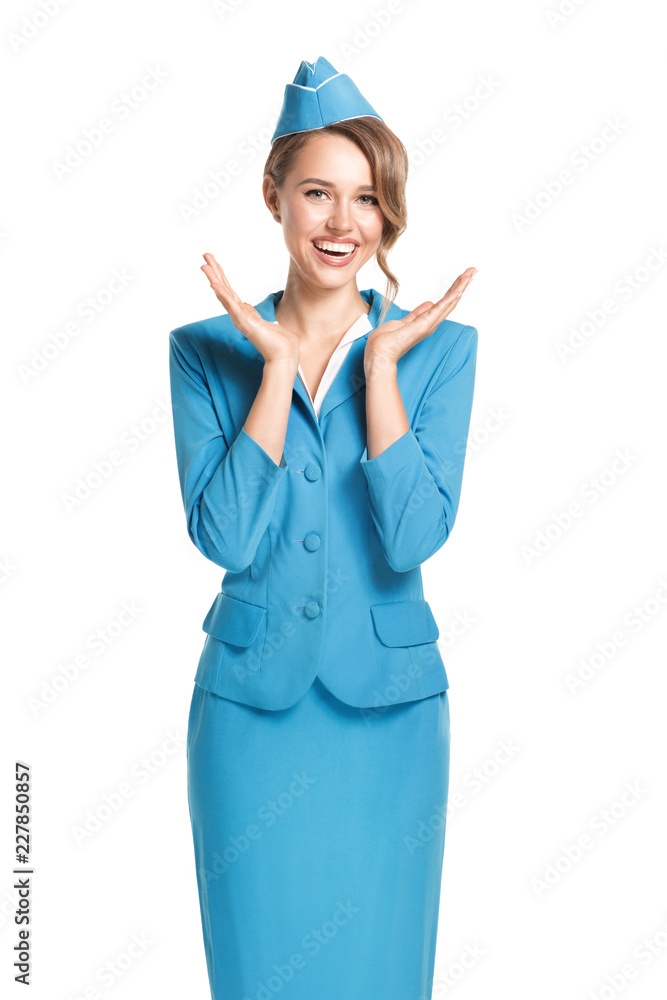 Portrait of charming stewardess wearing in blue uniform. Isolated on white background. Portrait of charming stewardess wearing in blue uniform. Isolated on white background.