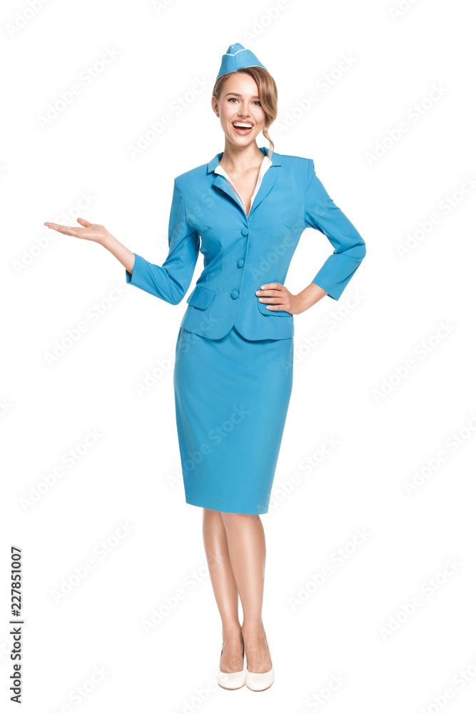 Portrait of charming stewardess wearing in blue uniform. Isolated on white background. Portrait of charming stewardess wearing in blue uniform. Isolated on white background.