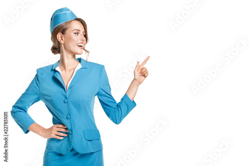 Obraz na płótnie Portrait of charming stewardess wearing in blue uniform