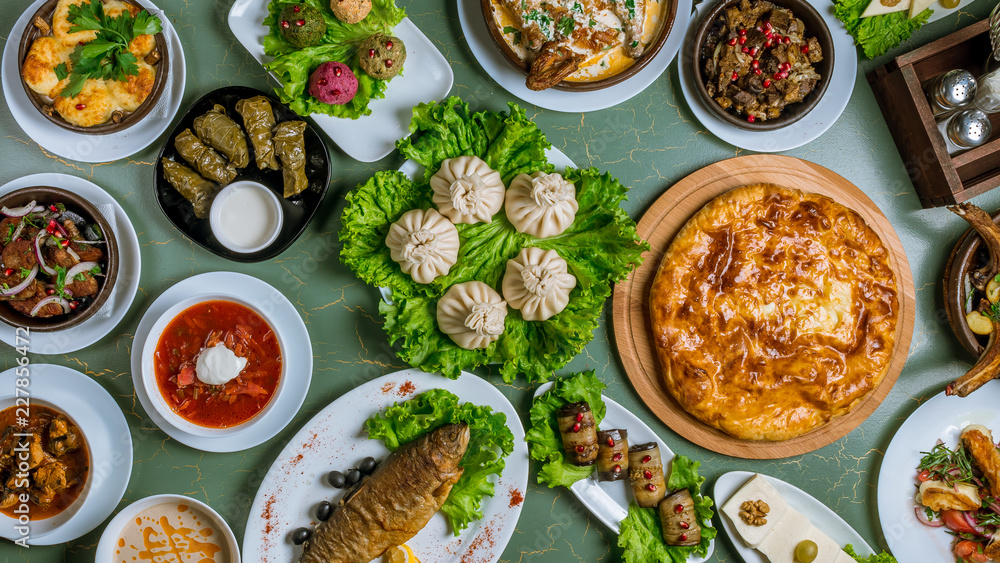 Georgian cuisine foodset from khachapuri, khinkali, pkhali, dolma, satsivi top view