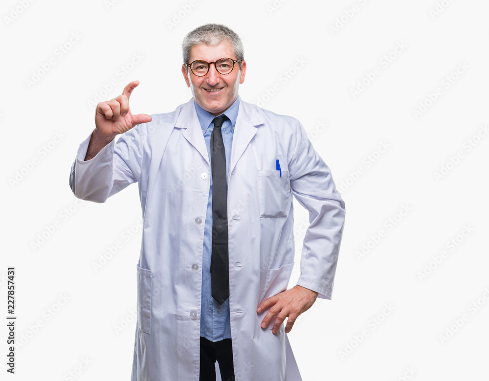 Handsome senior doctor, scientist professional man wearing white coat over isolated background smiling and confident gesturing with hand doing size sign with fingers while looking and the camera Handsome senior doctor, scientist professional man wearing white coat over isolated background smiling and confident gesturing with hand doing size sign with fingers while looking and the camera