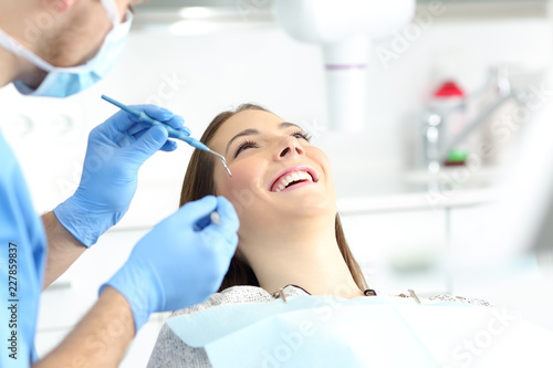 Woman with perfect smile in a dentist office