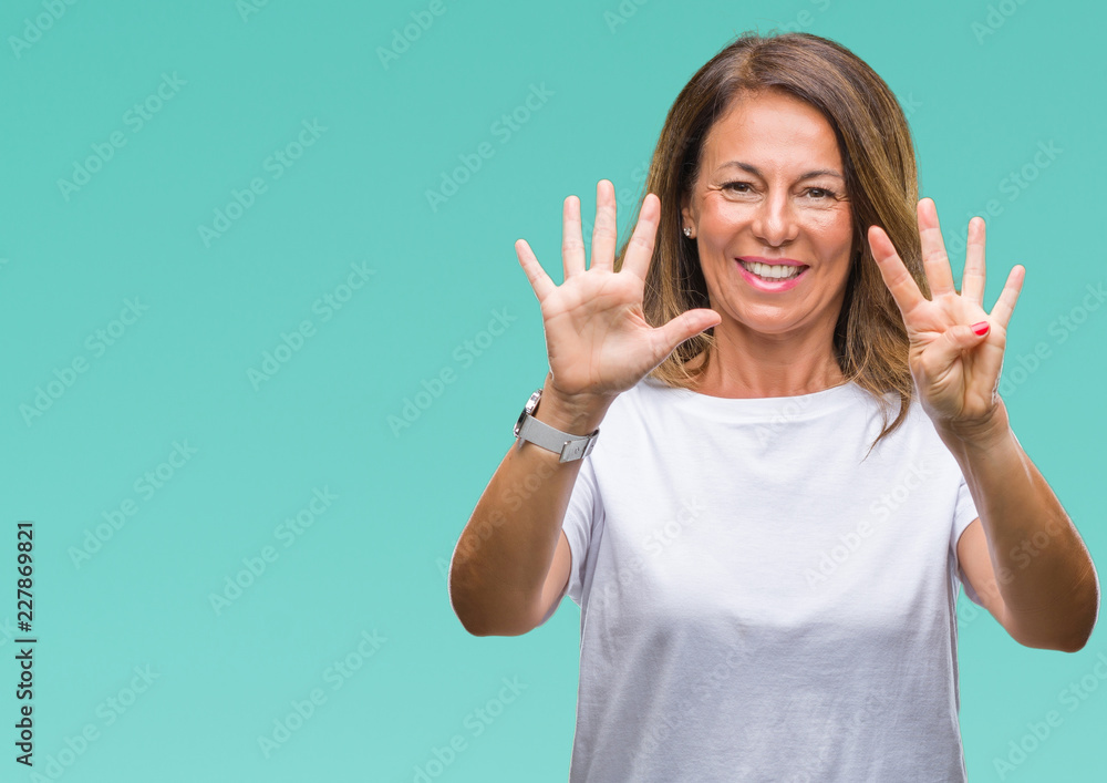 Middle age senior hispanic woman over isolated background showing and pointing up with fingers number nine while smiling confident and happy. Middle age senior hispanic woman over isolated background showing and pointing up with fingers number nine while smiling confident and happy.