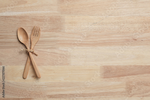 wooden table top with Kitchen ware for background