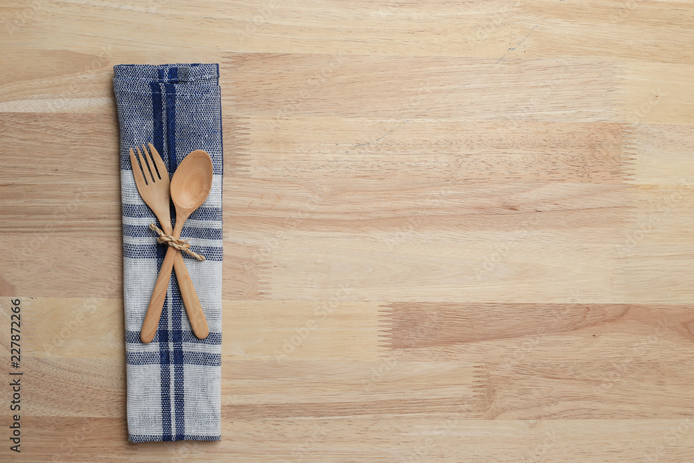 wooden table top with Kitchen ware for background