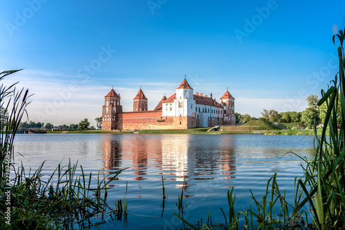 Mir Castle in Belarus. The castle is reflected in the lake opposite it