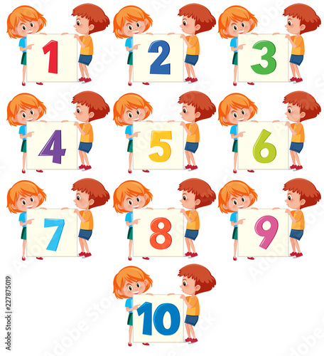 Children holding number board