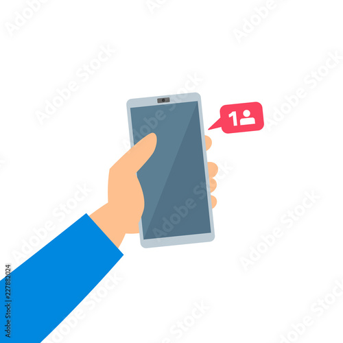 human hand holding smartphone with new follower icon