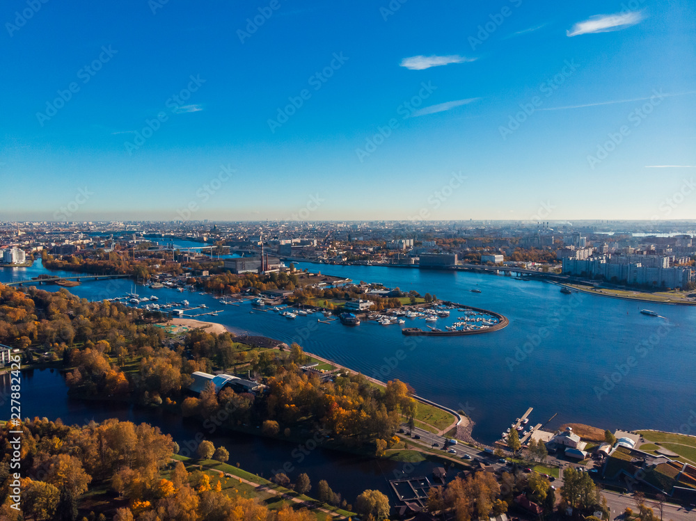 Saint-Petersburg. Gulf of Finland. Autumn urban landscape. Clear blue sky. Bridges. Residential area. Pleasure boats .
