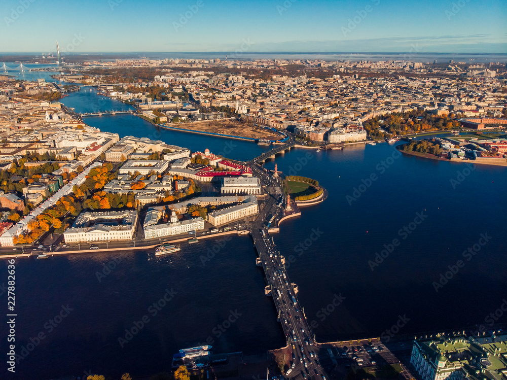 St. Petersburg top view aerial drone. Bridges over deep blue river Neva to Islands forming city .