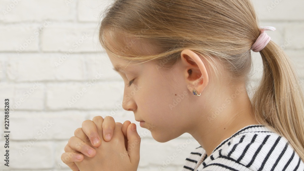 Child Face Praying Before Eating, Kid in Kitchen, Girl Portrait Meditating Child Face Praying Before Eating, Kid in Kitchen, Girl Portrait Meditating
