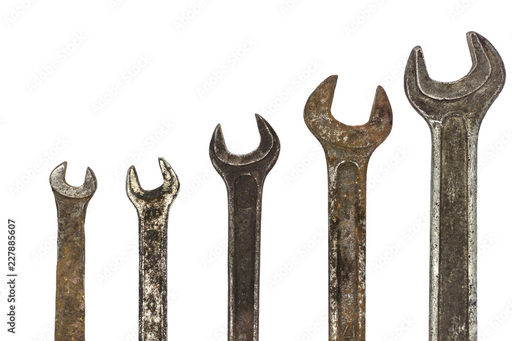 Old rusty spanners isolated on white background. wrench close up Old rusty spanners isolated on white background. wrench close up