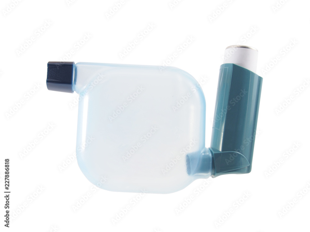 Blue asthma inhaler with spacer isolated on white background ...