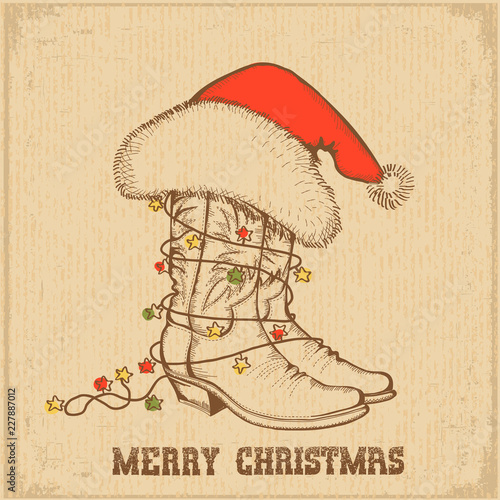 Western Christmas greeting card with cowboy traditional boots and Santa Claus hat