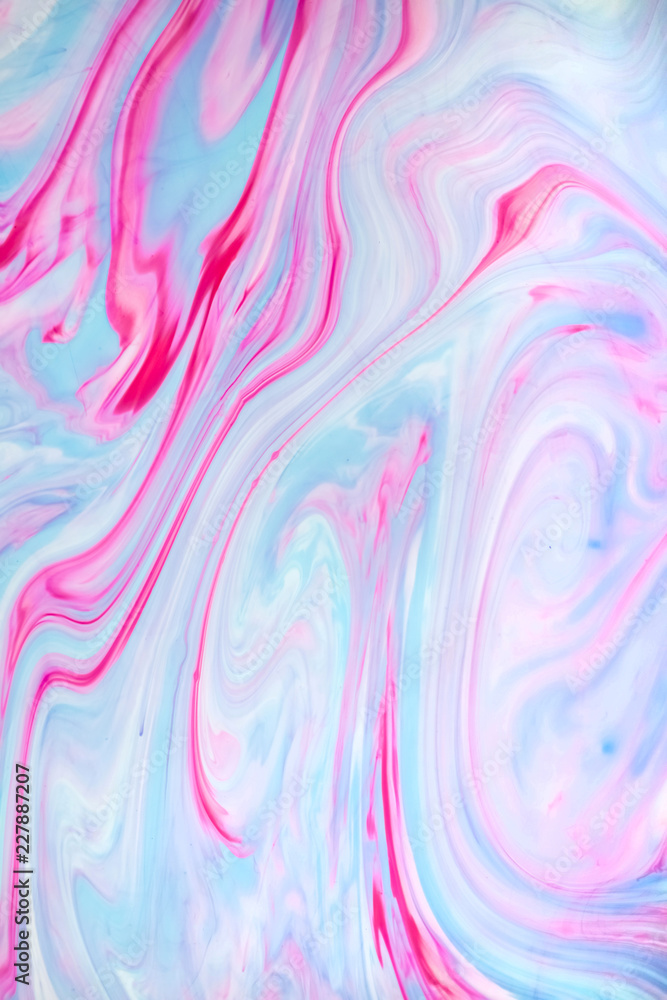 Abstract colored background. Stains of paint on the water. Ebru art, marbled paper.