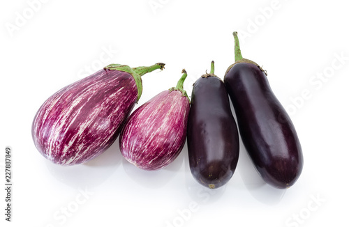 Wallpaper Mural Uncooked purple conventional and Graffiti eggplants on a white background Torontodigital.ca