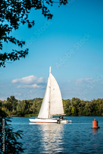 Romantic walk on the lake on a white yacht. Rest on the lakes of Cumbria