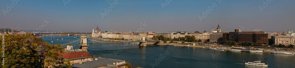 City view of Budapest, Hungary, Eastern Europe. The Parliament building, the Chain Bridge over the River Danube and colorful buildings of the old town.