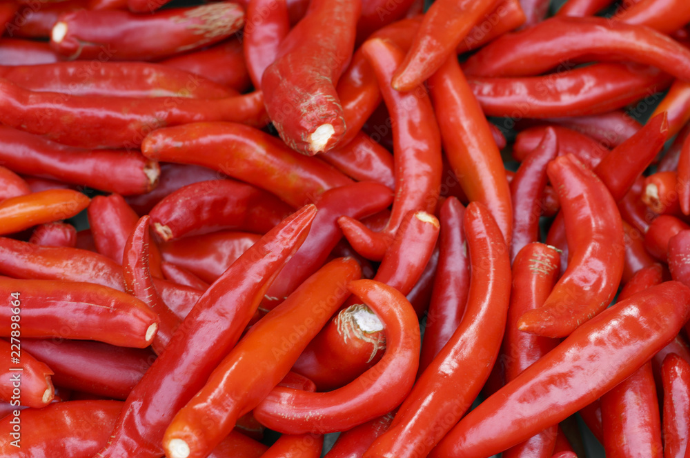 Red chili pepper close-up, texture, food background