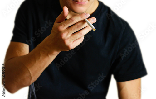A man holding a cigarette. Close up. Isolated background