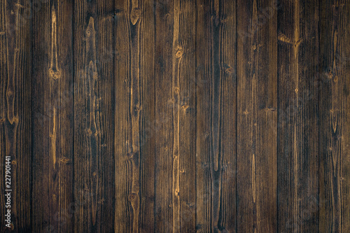 Dark brown wood texture with natural striped pattern background