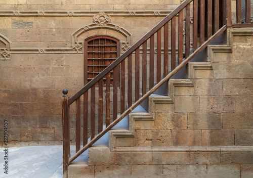 Staircase with wooden balustrade leading to Zeinab Khatoun historic house, Darb Al-Ahmar district, Old Cairo, Egypt