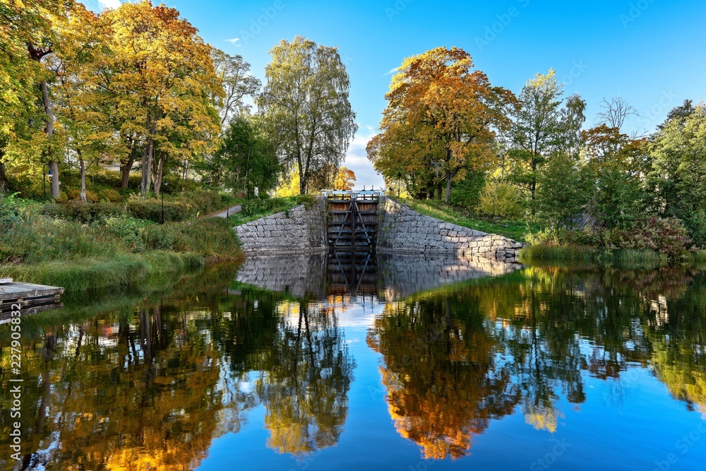 Beautiful autumn view of a lock gate in Sweden Beautiful autumn view of a lock gate in Sweden