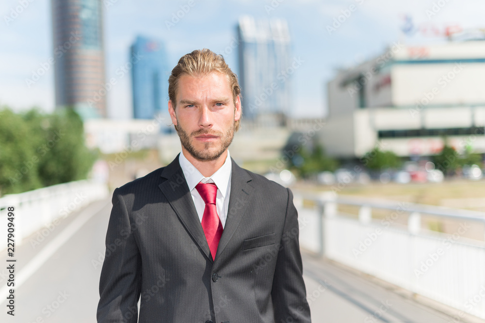 Handsome businessman in a business environment