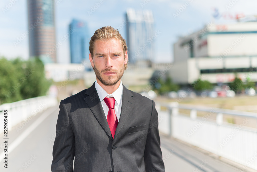 Handsome businessman in a business environment Handsome businessman in a business environment