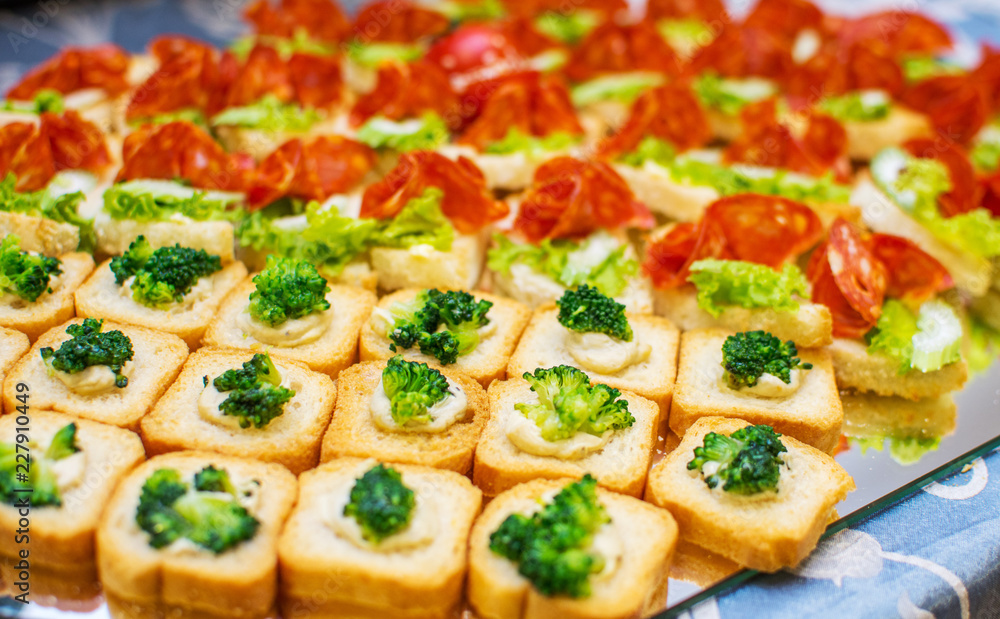 Delicious catering canapes on a buffet table Delicious catering canapes on a buffet table