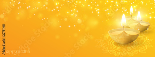 Shiny banner with oil lamps for Diwali Festival of lights decoration.