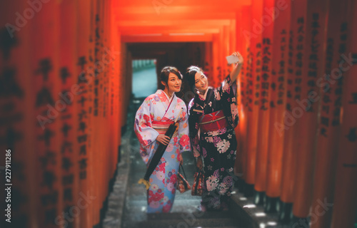 Photography Two japanese girls wearing kimonos traditional clothes, lifestyle moments