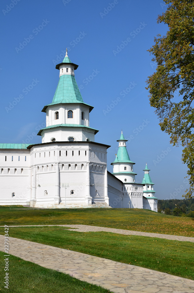 The fortress wall and eight towers of the New Jerusalem Monastery were built under the guidance of architect Yakov Bukhvostov in 1690. Russia, Istra, September 2018