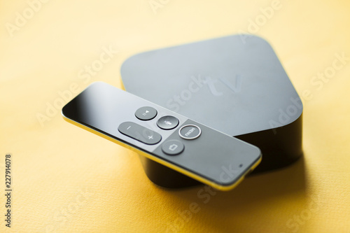 Remote control devices concept. Set of controller and micro console for TV watching and online streaming. Top view. Space for a text. Close up. photo