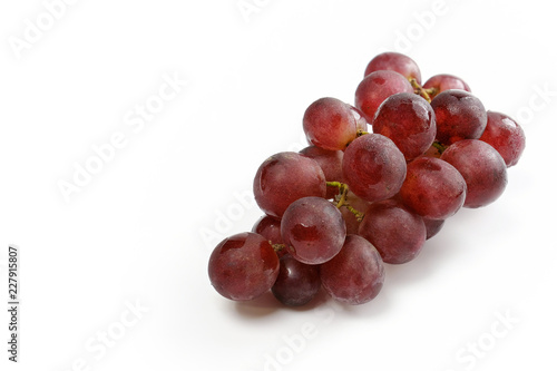 Bunch of grapes on a white background.