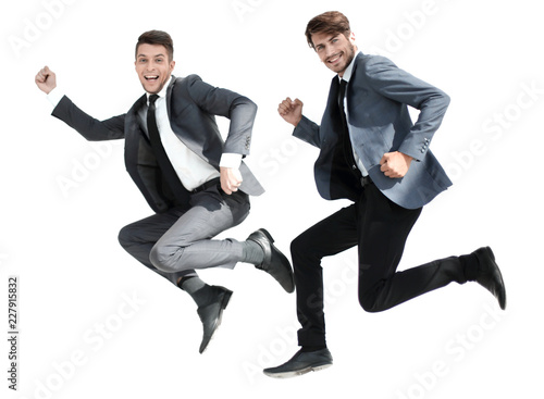 two office manager in a joyous leap