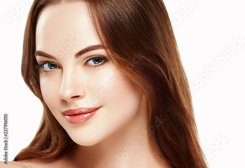 Beautiful woman face with make up and beauty healthy skin and hair portrait. Studio shot.