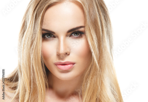 Blonde woman beautifu; eyes and makeup cosmetic concept beauty lips and hairstyle
