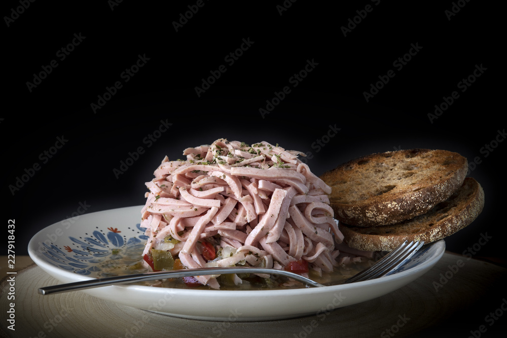 typical sausage salad with bread