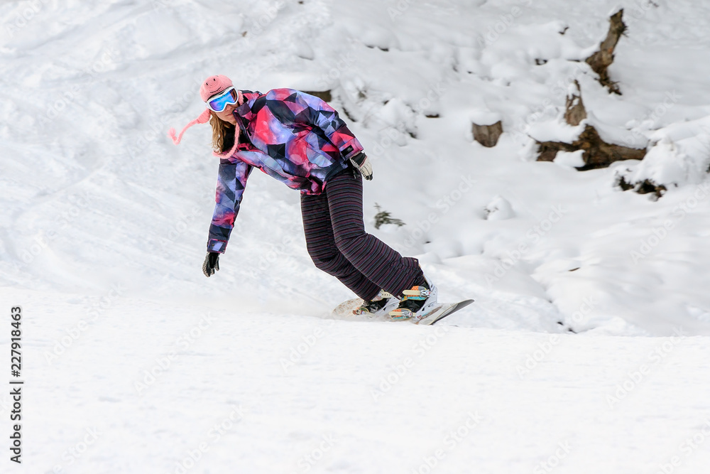 custom made wallpaper toronto digitalBeautiful young woman snowboarding on the snowy ski slopes on a winter day in the Alps in the Brandnertal, Vorarlberg Austria