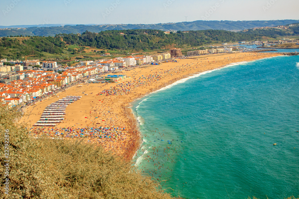 Seaside town with beach panorama view,Nazare Portugal.