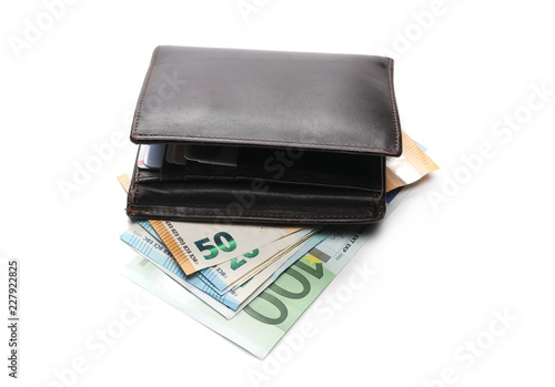 Euro banknotes, bills in leather wallet isolated on white background