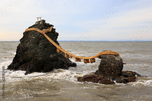 Wedded Rocks, or Meoto Iwa in Japanese, in the Pacific Ocean just off the coast of Ise Prefecture photo