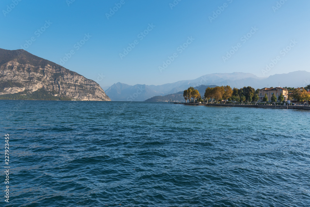 Iseo lake and surroundings in nice autumn day, Lombardy, Italy.